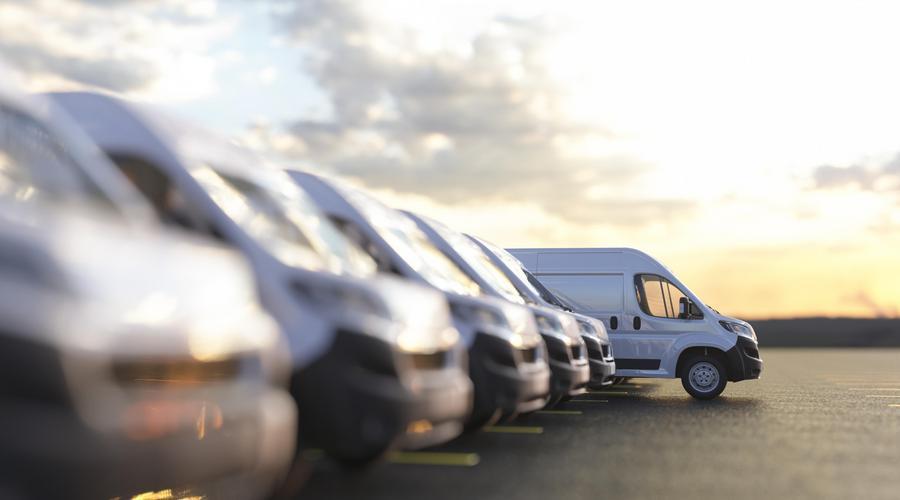 White vans lined up